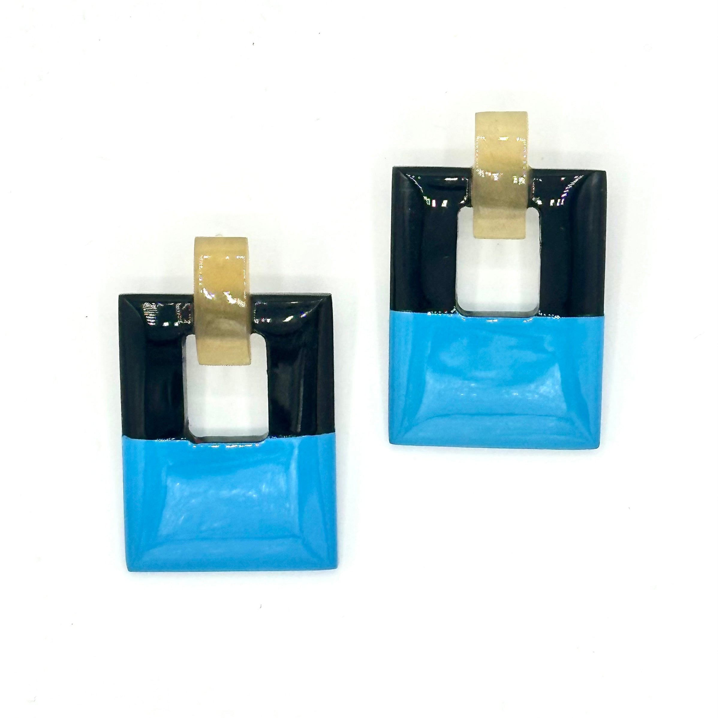 Hinged Horn Earrings lifestyle shot showing lightweight statement style