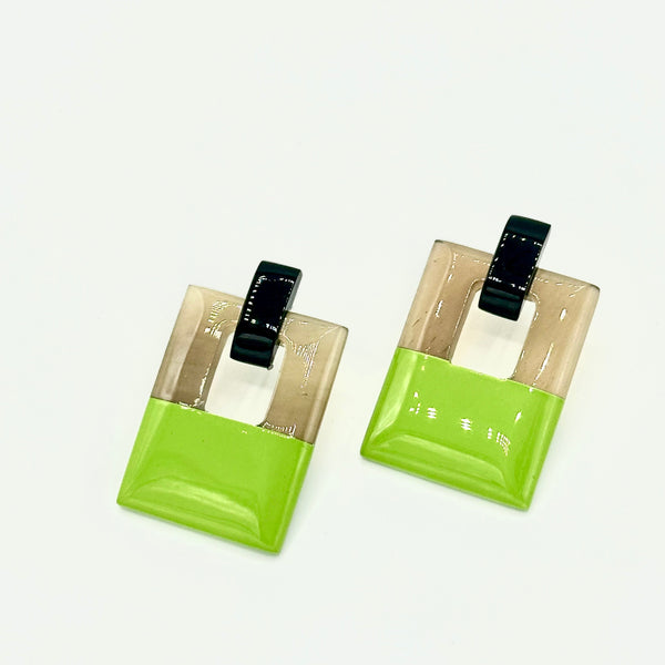 Side view of Hinged Horn Earrings displaying 2-inch length and nickel-free ear wires