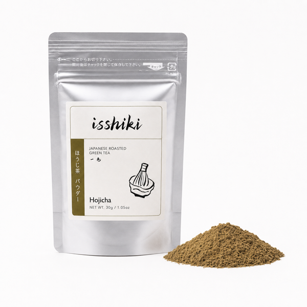 Hojicha Roasted Green Tea Powder pack from Isshiki Matcha beside loose tea powder