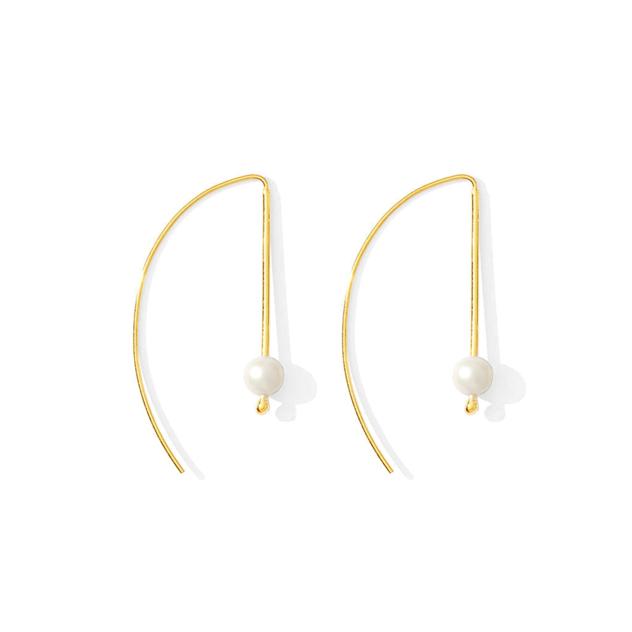 A pair of gold-plated hook earrings with freshwater pearls hanging at the end, displayed against a white background.