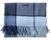 Plaid blanket with fringes and 'Comb3' branding on a white background