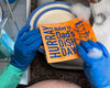 Close-up of Dad's Dish Day Swedish dishcloth by Soak iT Up showing cellulose-cotton fabric texture and colourful printed Father's Day message
