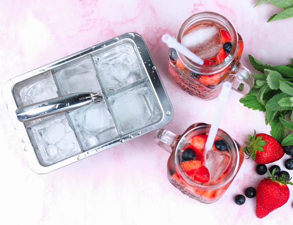 Close-up of Ecozoi stainless steel ice cube tray filled with water ready to freeze