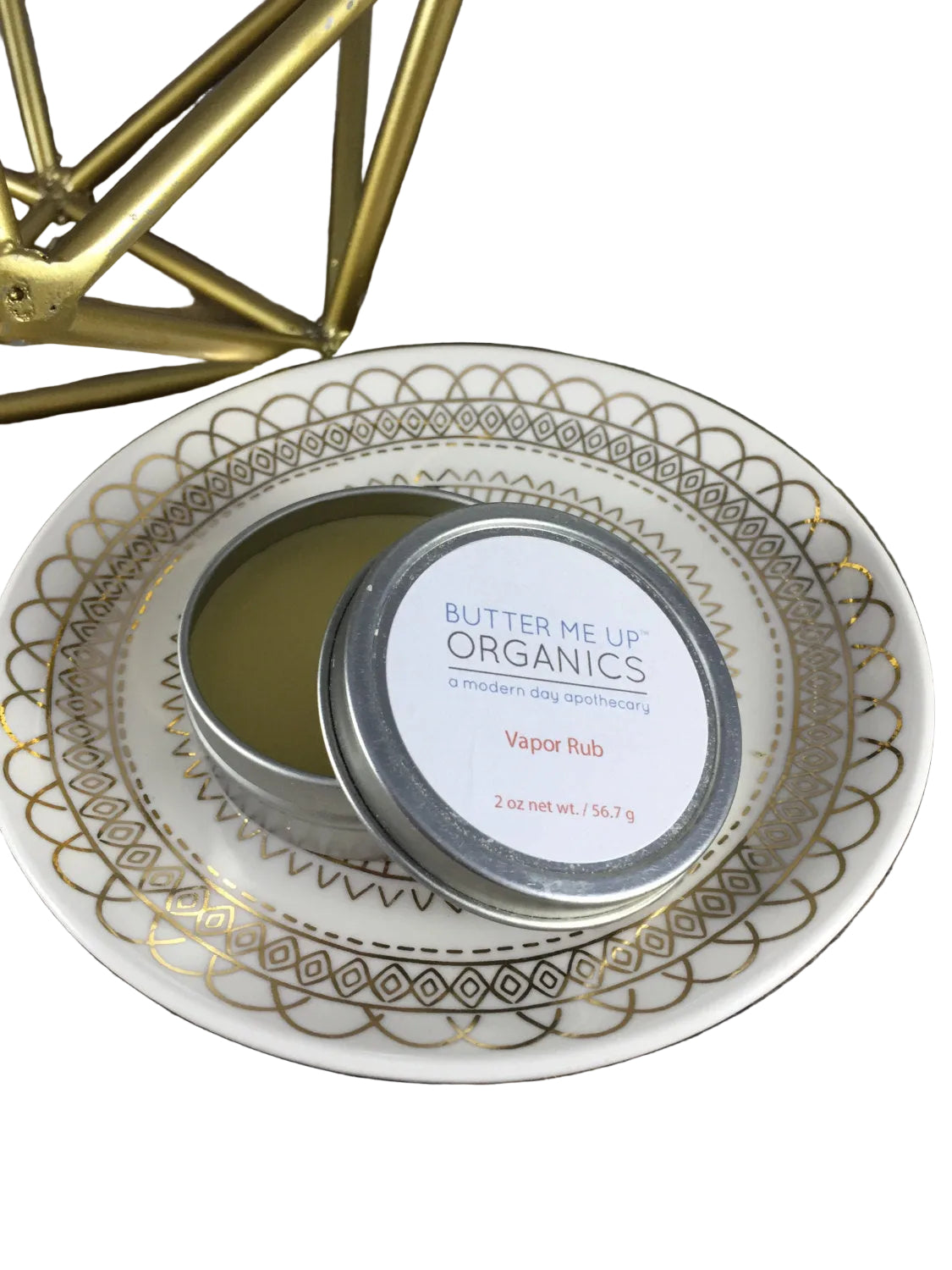 Close-up of natural petroleum-free chest rub balm with olive oil and beeswax base by Butter Me Up Organics