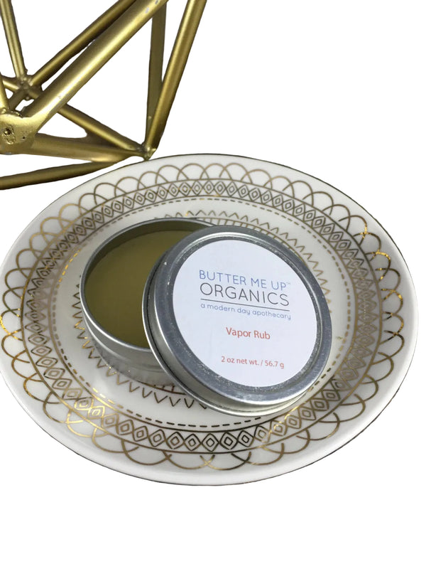 Close-up of natural petroleum-free chest rub balm with olive oil and beeswax base by Butter Me Up Organics