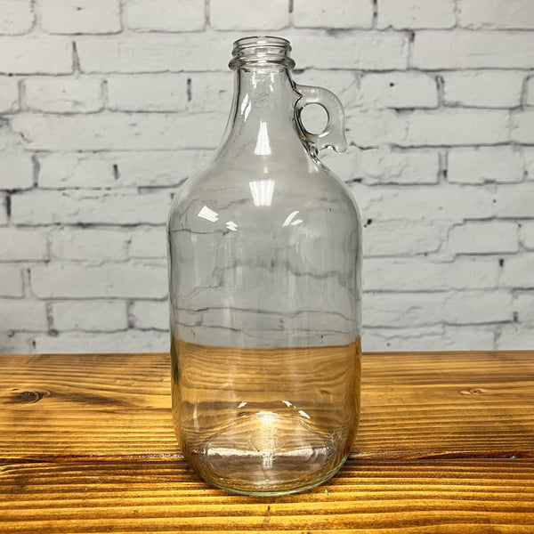 Half gallon glass jug with screw-top cap by Rustic Strength — reusable glass storage for milk, cold brew, kombucha and juice