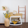 White pine wood Moses basket stand with brake feature, compatible with Plum+Sparrow Moses baskets