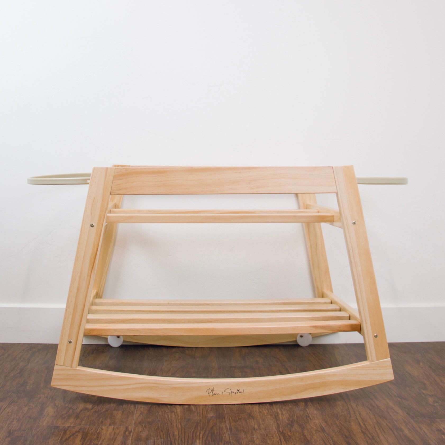 Plum+Sparrow classic natural pine wood rocking Moses bassinet stand with brake, shown without basket