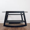 Plum+Sparrow Classic Rocking Moses Bassinet Stand in black painted pine wood, shown without basket