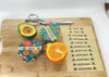 Meli Wraps Beeswax Wrap labeled with a Buzz Words sticker in the refrigerator