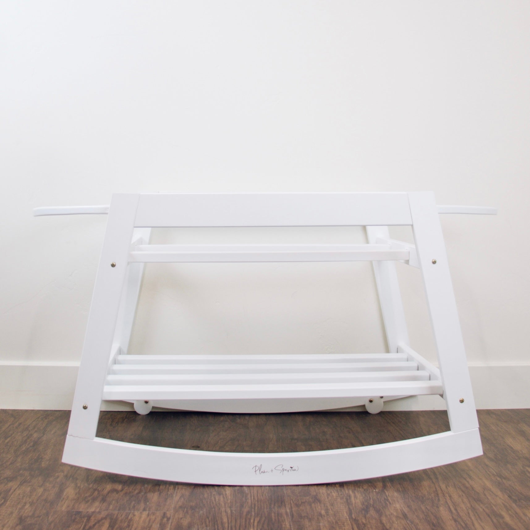 Plum+Sparrow Classic Rocking Moses Bassinet Stand in white painted pine wood, shown without basket