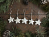Set of five Snowberry White needle-felted wool star ornaments