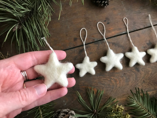 Snowberry White wool star ornament with cotton string loop