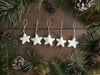 Wool star ornaments in Snowberry White for holiday decoration