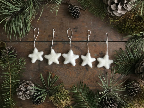 Wool star ornaments in Snowberry White for holiday decoration