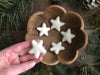 Felted wool stars in Snowberry White, needle-felted and slightly varied in shape
