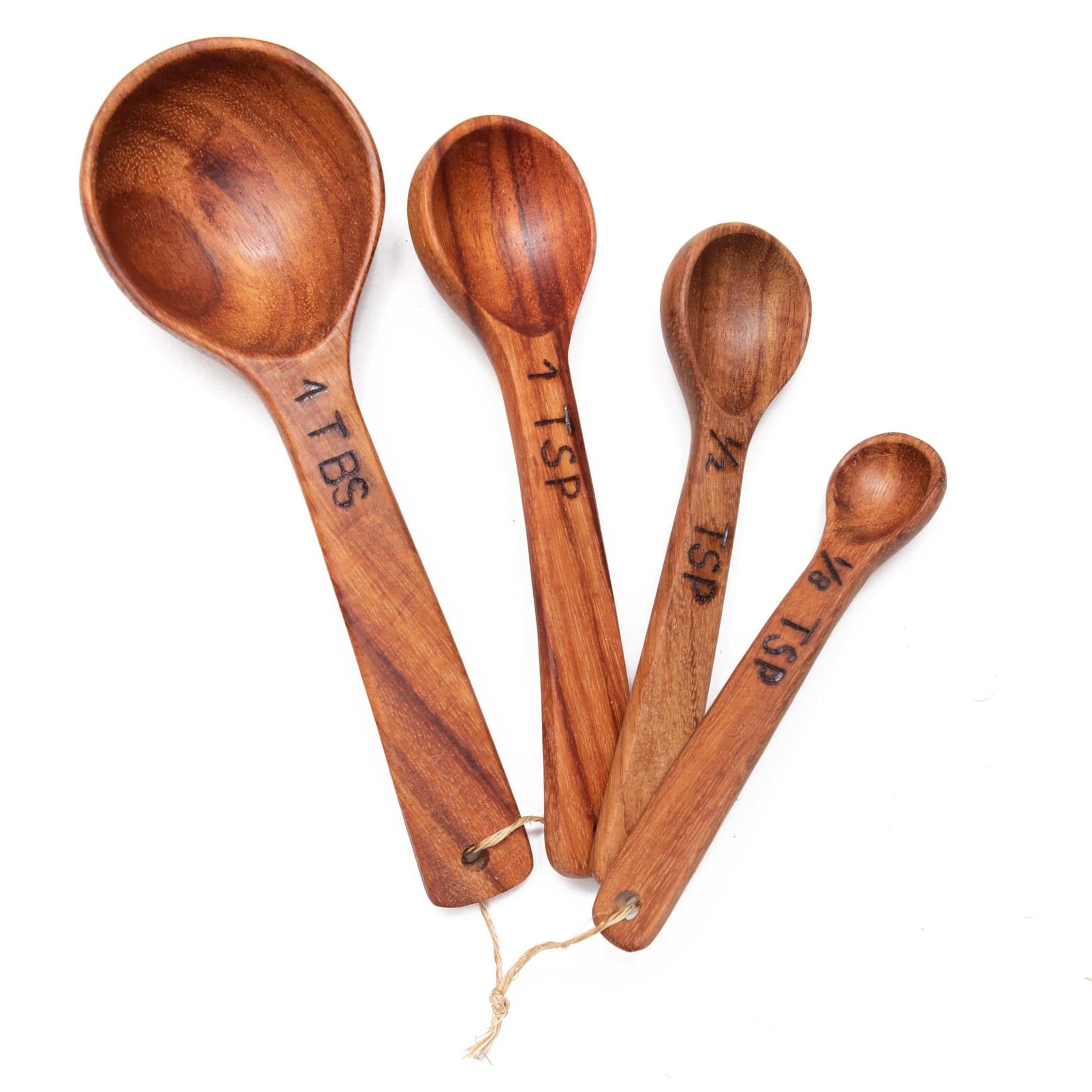 Enhance your cooking experience with our handcrafted Wood Measuring Spoon Set. Made from reclaimed wood and featuring precise measurements, these spoons are both functional and stylish.