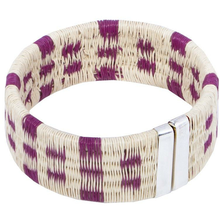 Tulia Island Palm Woven Cuff in fuchsia with sterling silver closure handcrafted in Colombia