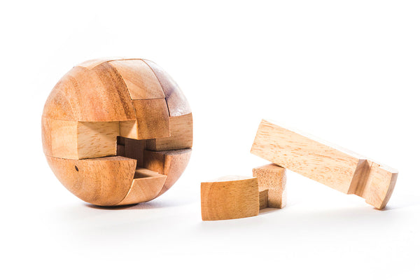 Japanese interlocking Kumiki ball puzzle showing piece detail and craftsmanship