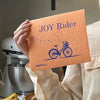 Joy Rider reusable Swedish dishcloth by Soak iT Up – compostable eco gift for bike lovers under $20