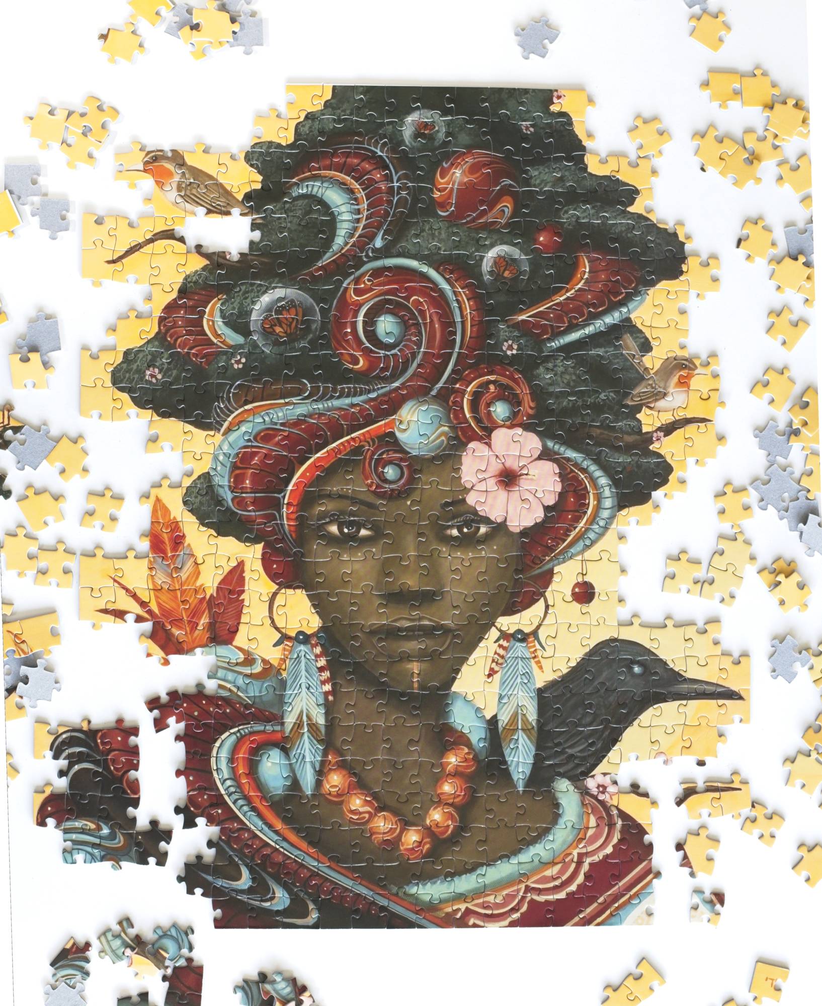 Kianga jigsaw puzzle partly assembled on a table