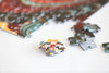 Close-up of Kianga jigsaw puzzle pieces made from recycled puzzle board