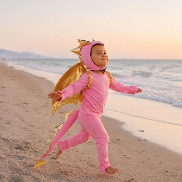 Kid dressed in the Pink Sky Dragon costume for Halloween