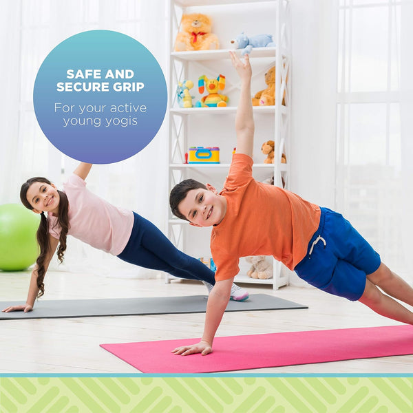 Two children on yoga mats with a shelf of toys in the background
