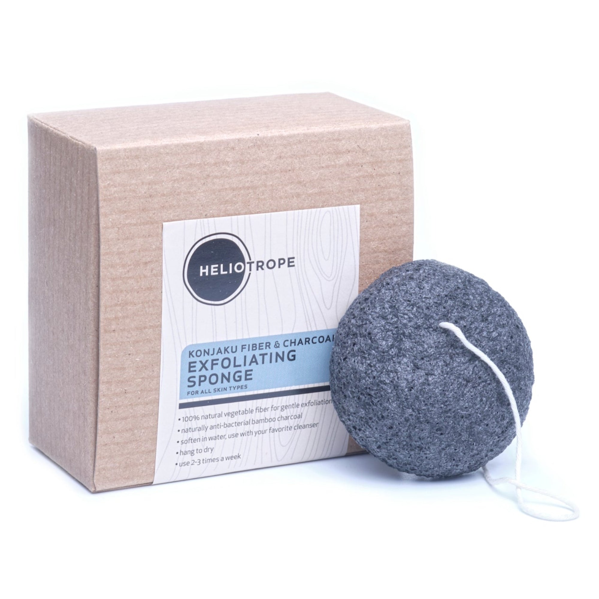 Heliotrope SF natural konjac and charcoal exfoliating sponge on a clean white surface