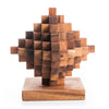 Wooden puzzle sculpture on a white background