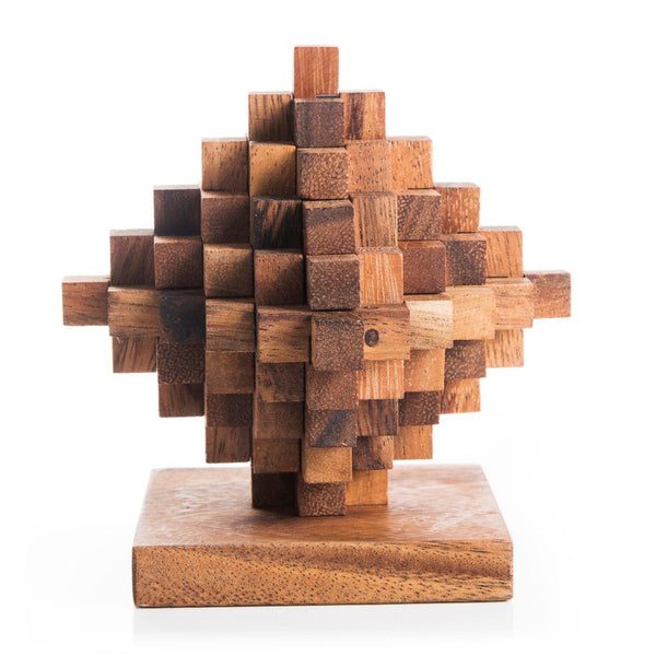 Wooden puzzle sculpture on a white background