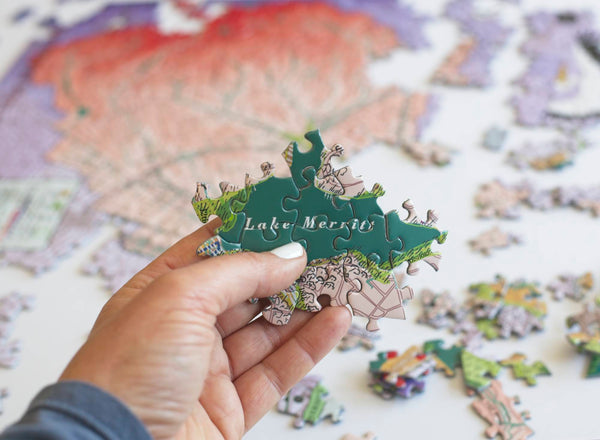 Close-up of Lake Merritt Watershed puzzle pieces with matte finish