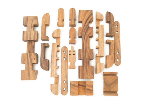 Set of wooden puzzle pieces on a white background