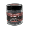 Jar of Saltverk Lava Salt with black lid on a white background