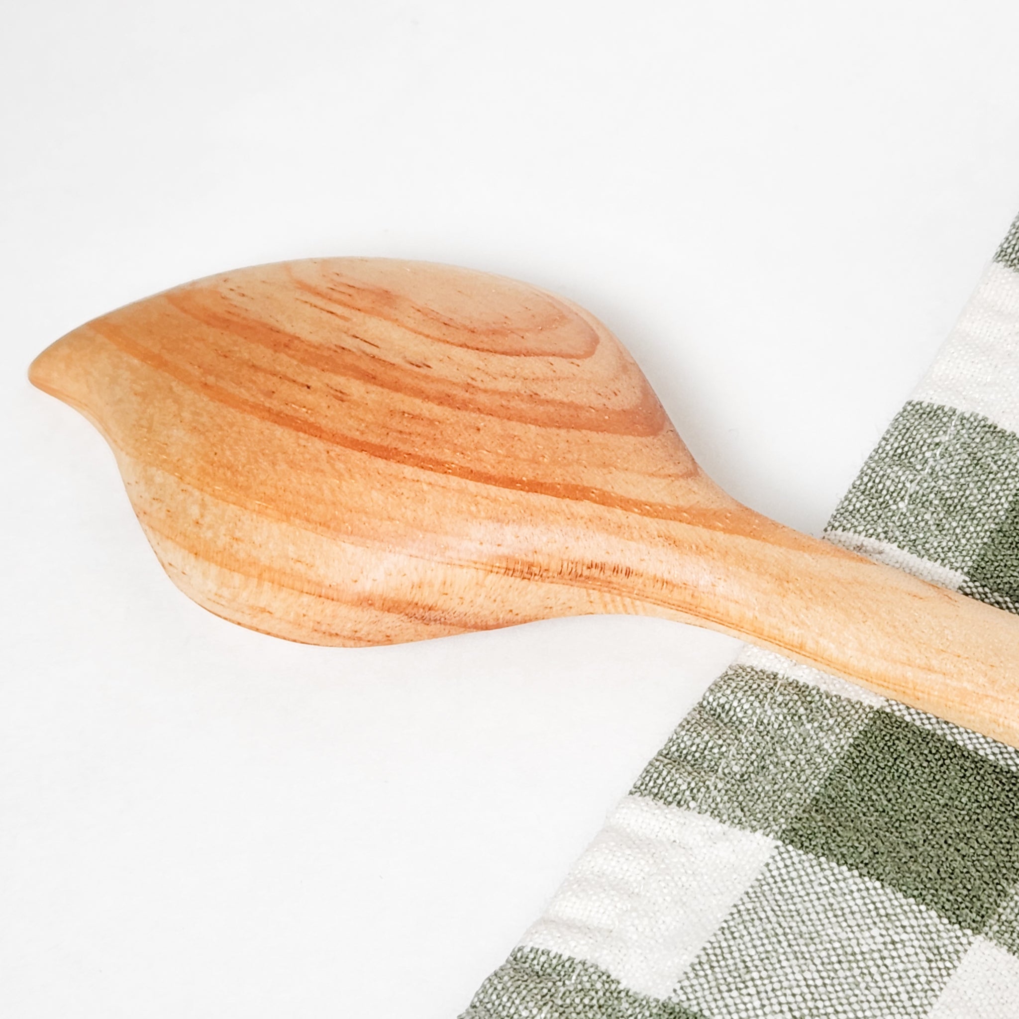 Enhance your dining experience with our handcrafted Wood Leaf Spoon. Made from reclaimed wood, this stylish and functional spoon is perfect for serving soups, stews, and sauces.