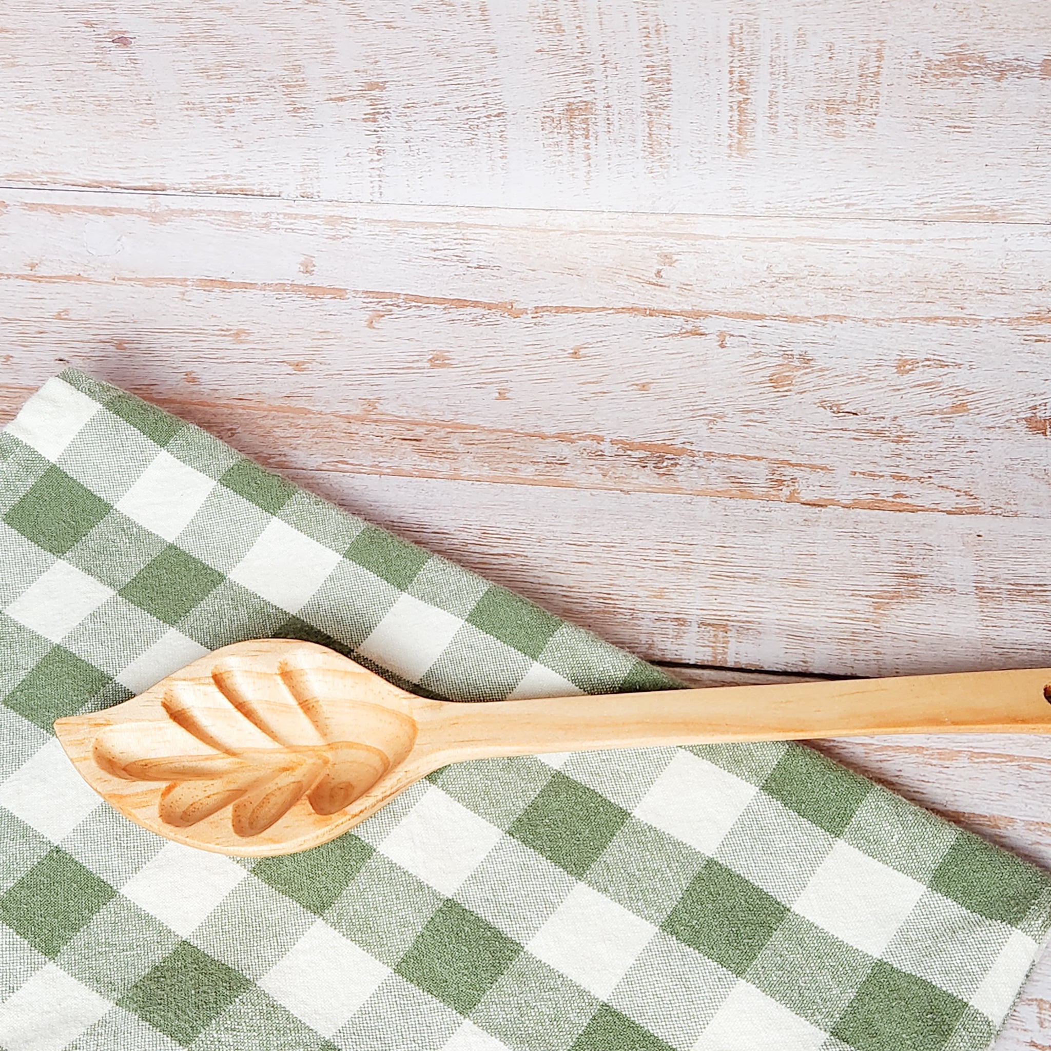 Enhance your dining experience with our handcrafted Wood Leaf Spoon. Made from reclaimed wood, this stylish and functional spoon is perfect for serving soups, stews, and sauces.