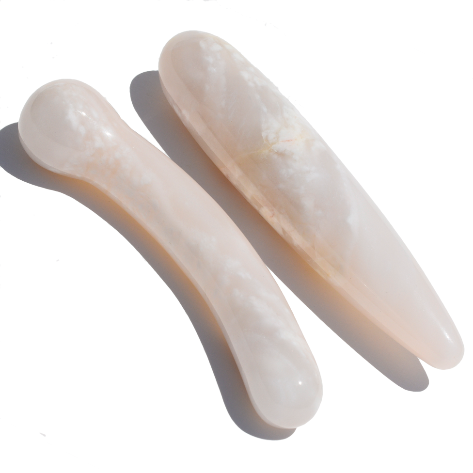 Peach Aventurine crystal wand laying flat showing light peachy colour variation and polished surface