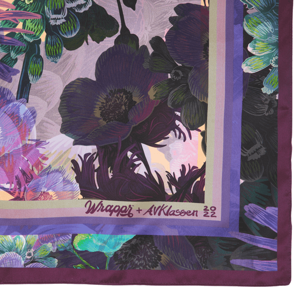 Floral patterned fabric with 'Wrapper + AVKlaseen 22' branding