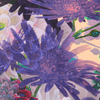 Colorful floral pattern with purple flowers on a beige background