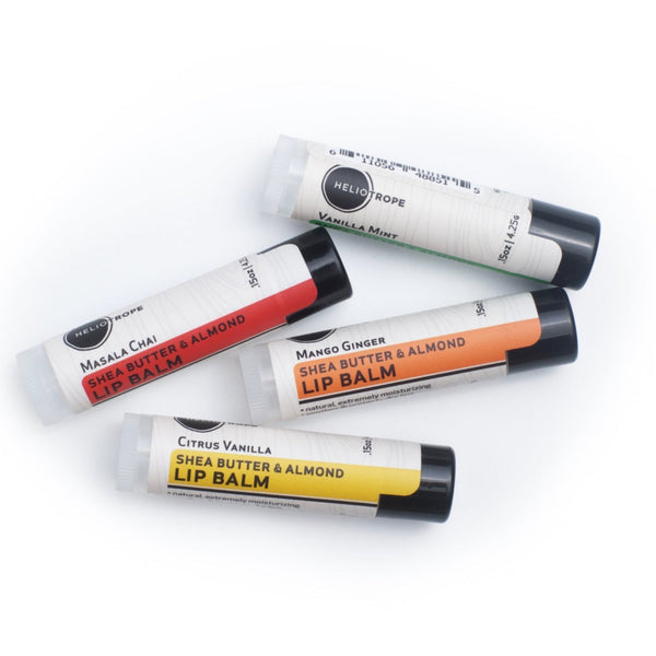 Close-up of Shea Butter and Almond Lip Balm tube showing plant-based ingredients