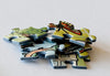 Close-up of Long Lost Oakland jigsaw puzzle pieces