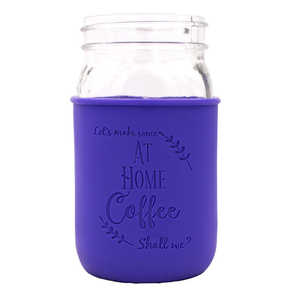 Glass jar with a purple sleeve featuring text on a white background