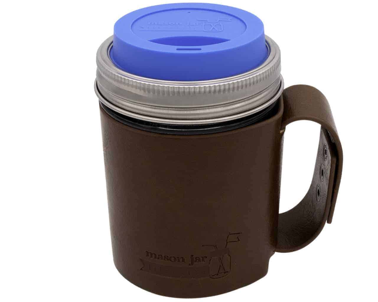 Brown leather mug with a silver lid and blue top on a white background