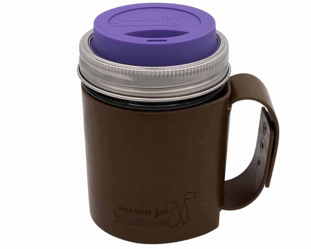 Brown mason jar with purple lid on a white background