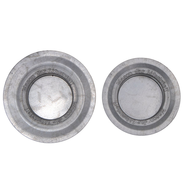 Two metallic washers on a white background. Transform your glass jars into glowing lanterns with the 6-Pack Tea Light Holder Metal Lid Inserts at Clozist. Rustic galvanized design leaves your jar free for decorative fill. The perfect sustainable gift for DIY decor, weddings, and cozy home lighting!