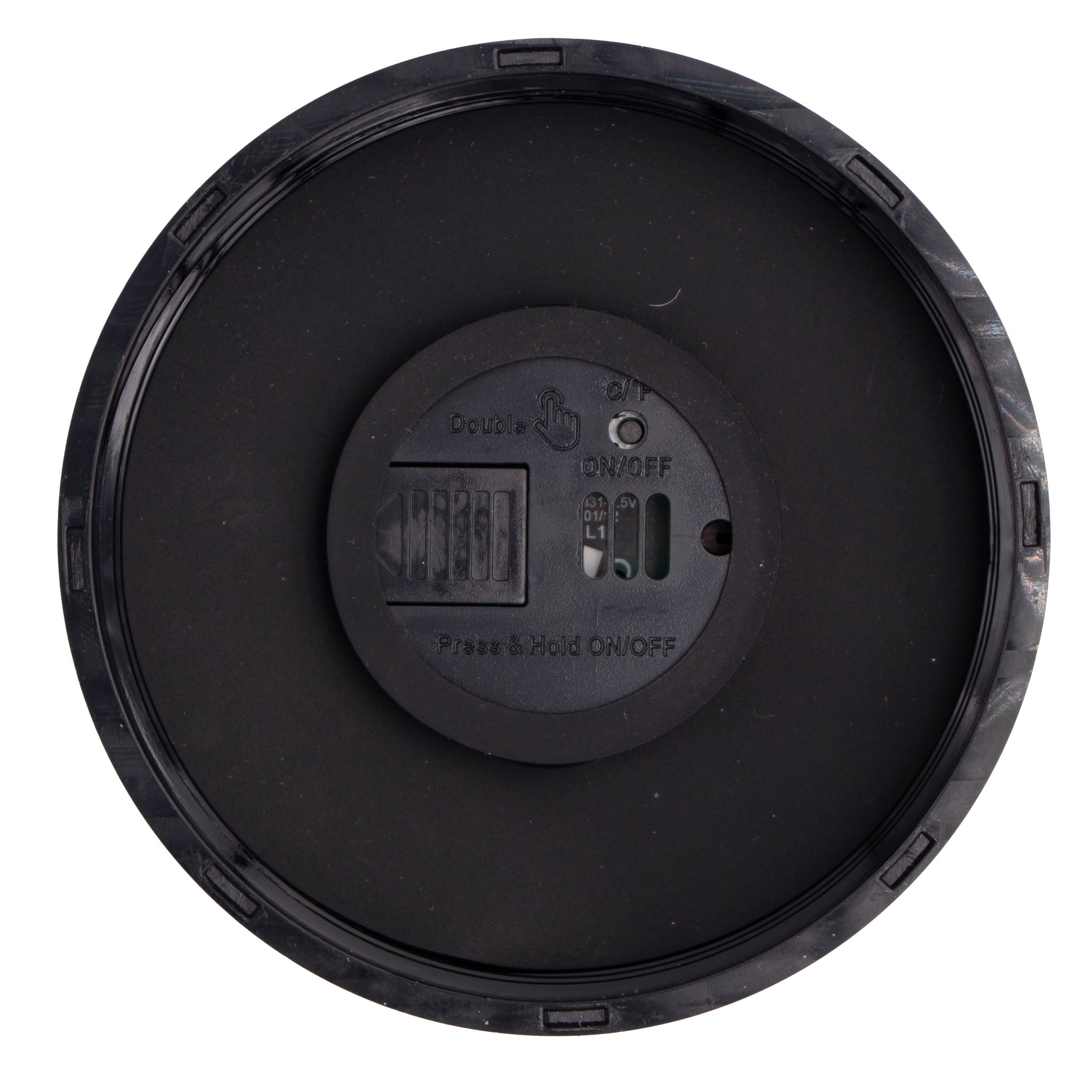 Black circular object with control buttons on a white background