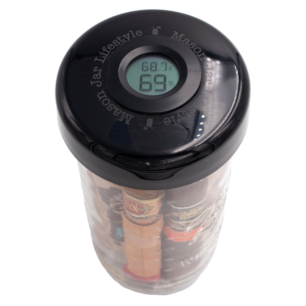 Clear tumbler with black lid featuring a digital thermometer on a white background