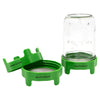 Green pet water dispenser with a clear container on a white background