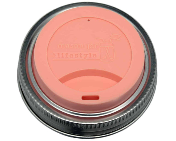 Pink coffee cup lid with 'lifestyle' branding on a white background