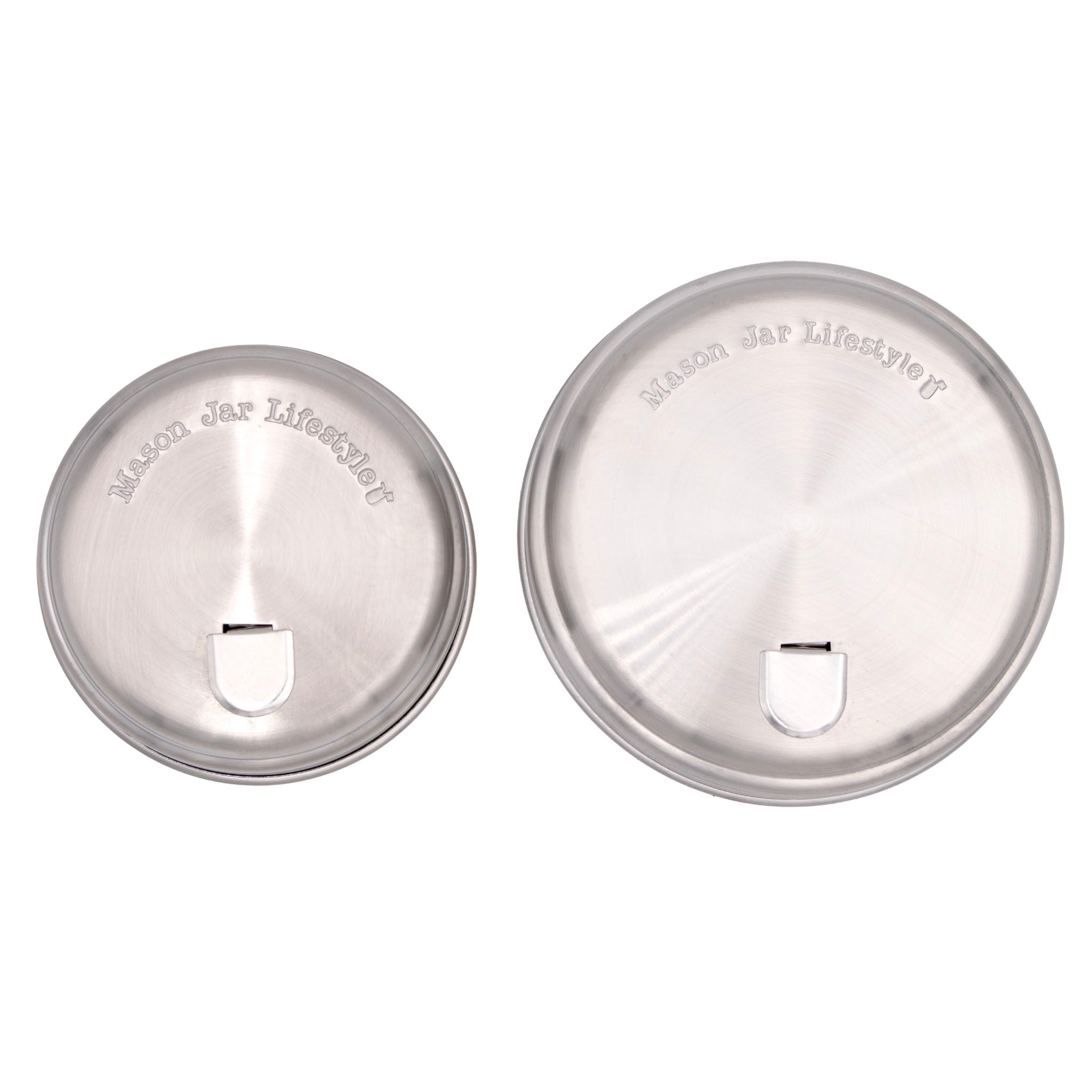 Two silver Mason jar lids on a white background